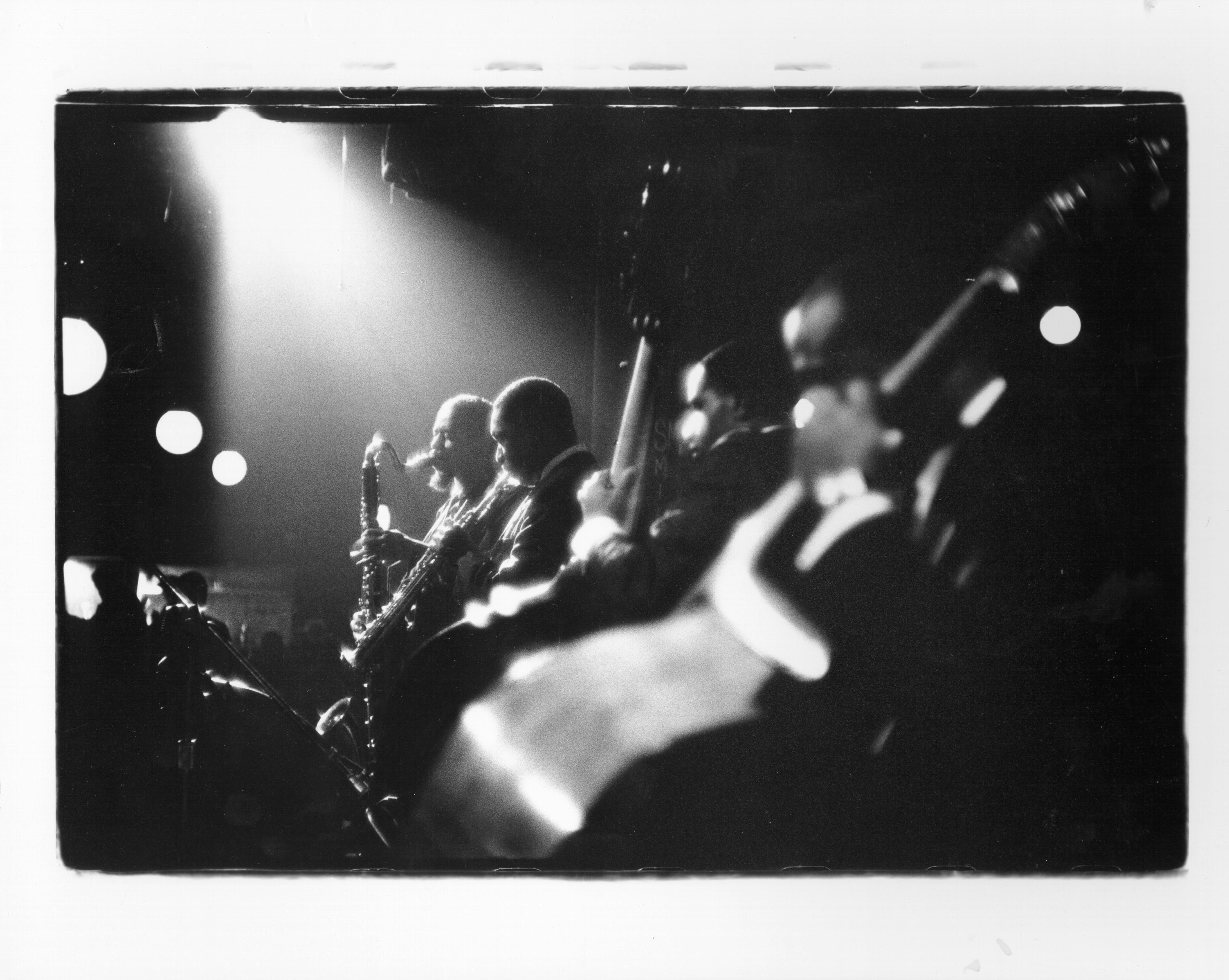 Eric Dolphy (left) onstage with John Coltrane and band in New York City, 1961. Photo by Herb Snitzer/Michael Ochs Archives/Getty Images.